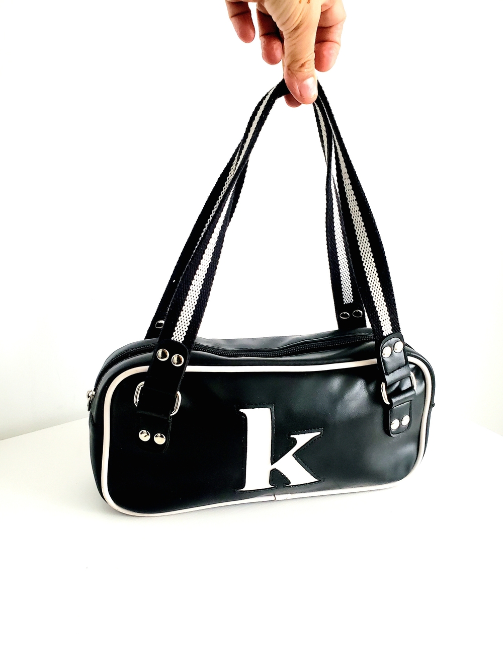 Kohl's Black Shoulder Bag with White 'K' Accent and Striped Handles